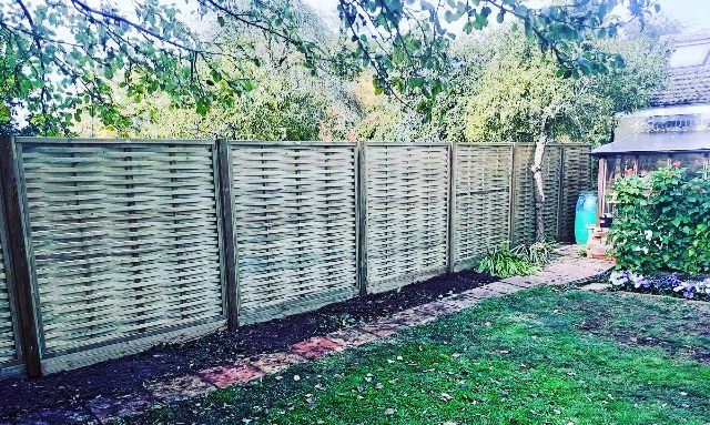 Woven fence panels in a garden in Piddington, Oxfordshire